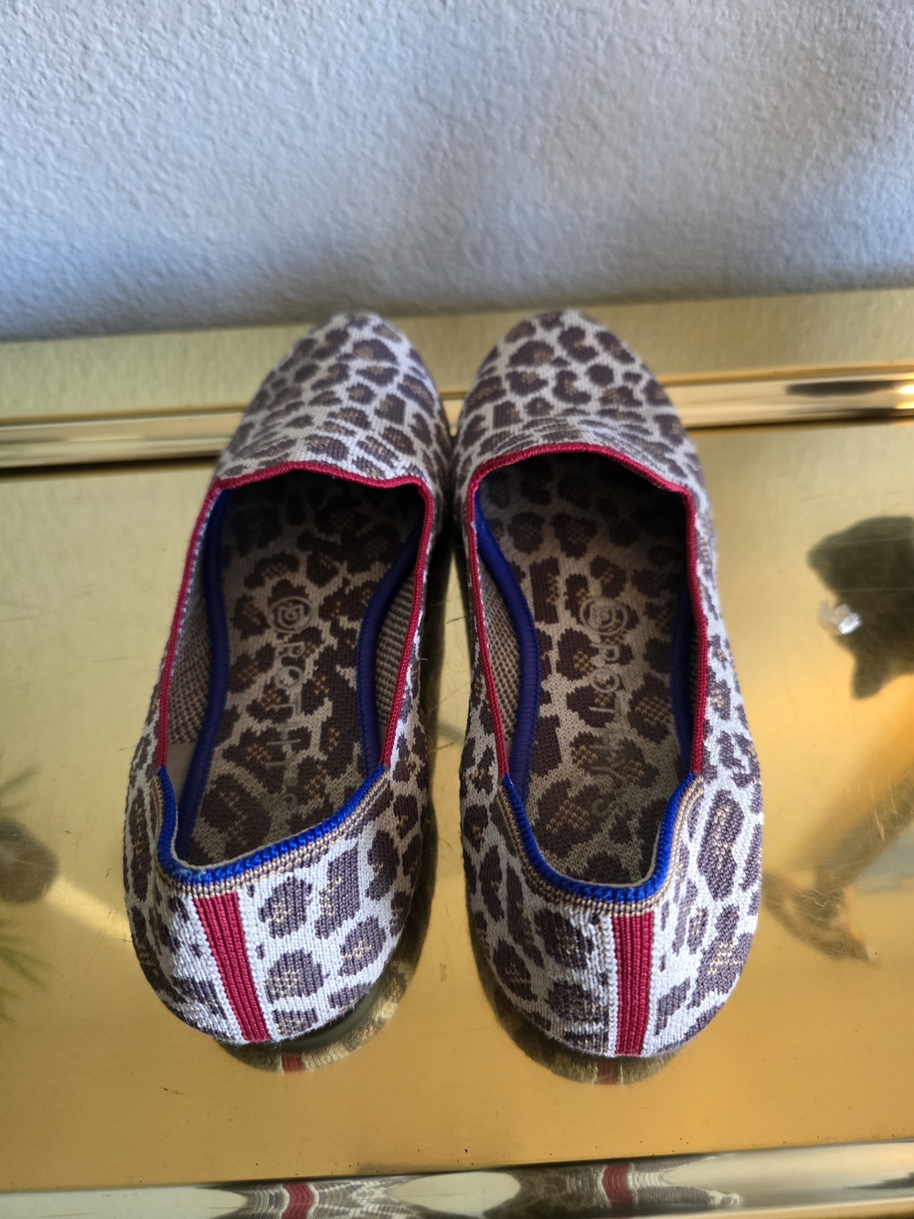 Rothy's Leopard Print Flats with Red & Blue Trim